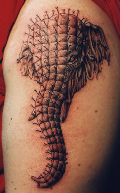 elephant with shaman inspired tattoos and piercings on Craiyon